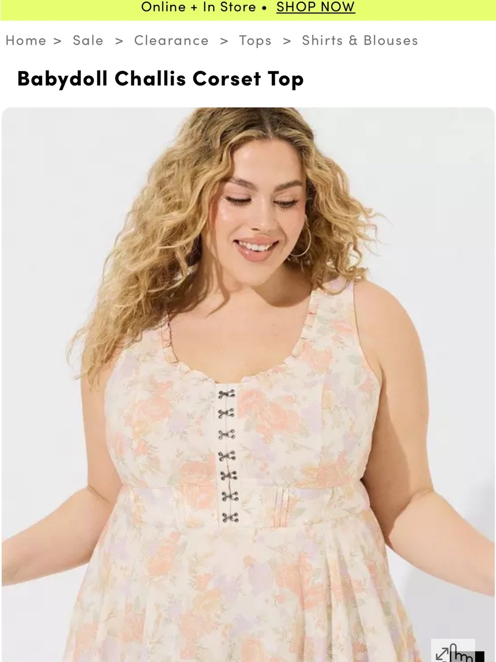Torrid Babydoll Challis Corset Top in a beige and orange floral pattern